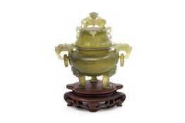 A SERPENTINE JADE TRIPOD CENSER AND COVER