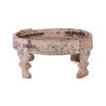 AN INDIAN HARDWOOD CHAKKI TABLE