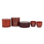 A GROUP OF FIVE BURMESE RED LACQUERED BOXES AND CUPS (5)