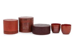 A GROUP OF FIVE BURMESE RED LACQUERED BOXES AND CUPS (5)