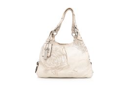 COACH - AN EMBROIDERED LEATHER HANDBAG
