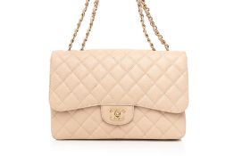 CHANEL - A BEIGE CLAIR CAVIAR CLASSIC FLAP JUMBO BAG
