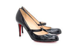 CHRISTIAN LOUBOUTIN - A PAIR OF BLACK PATENT LEATHER MARY JANE HEELS