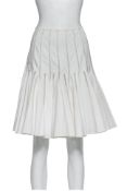 ALAÏA - A WHITE MINI SKIRT
