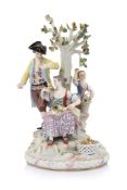 A MEISSEN FIGURAL PORCELAIN GROUP OF APPLE PICKERS
