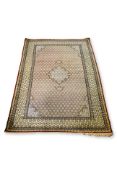 A FINE PERSIAN MEDALLION RUG (216 X 142CM)