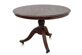A REGENCY MAHOGANY BREAKFAST TABLE