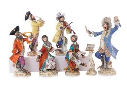 A GROUP OF SIX MEISSEN PORCELAIN MONKEY BAND FIGURES