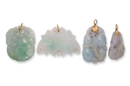 A GROUP OF FOUR JADEITE PENDANTS