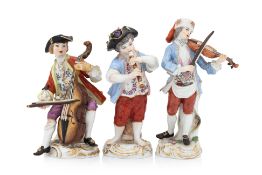 A GROUP OF THREE MEISSEN PORCELAIN FIGURES OF MUSICIANS