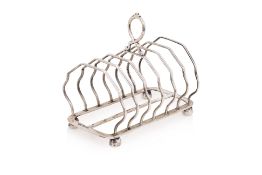 AN EDWARDIAN STERLING SILVER TOAST RACK