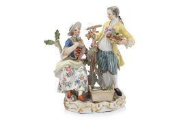 A MEISSEN FIGURAL GROUP OF A COUPLE IN A GARDEN