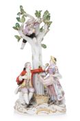 A MEISSEN PORCELAIN FIGURAL GROUP OF APPLE PICKERS