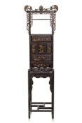A CARVED AND GILT TEAK WASH STAND