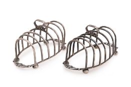 A PAIR OF ENGLISH STERLING SILVER TOAST RACKS