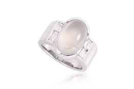 A JADEITE AND DIAMOND RING BY CANARY DIAMOND CO.