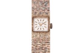 AN AVIA LADIES GOLD BRACELET WATCH
