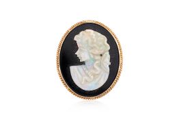 AN OPAL CAMEO BROOCH