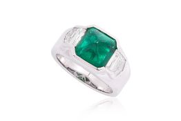 A 'MUZO GREEN' EMERALD AND DIAMOND RING
