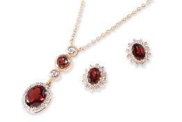 A GARNET AND DIAMOND NECKLACE WITH A PAIR OF GARNET AND WHITE STONE EARRINGS