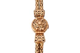 A GOLD BRACELET WATCH
