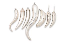 A GROUP OF EIGHT SILVER AND WHITE METAL FRUITS AND VEGETABLES