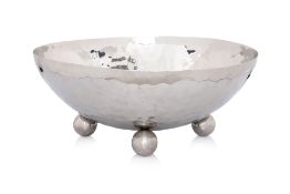 A LARGE LAMBERT HOME STAINLESS STEEL SERVING BOWL