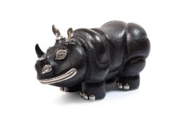 A LOTUS ART DE VIVRE LEATHER AND SILVER MODEL OF A RHINOCEROS