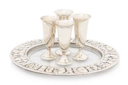 A SILVER AND GLASS DISH TOGETHER WITH A SET OF FOUR SILVER LIQUEUR CUPS
