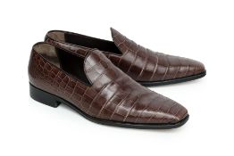 SALVATORE FERRAGAMO - A PAIR OF BROWN CROCODILE LEATHER LOAFERS