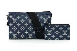 LOUIS VUITTON - A 'GASTON' WEARABLE WALLET
