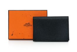 HERMÈS - A BLACK LEATHER CARD HOLDER