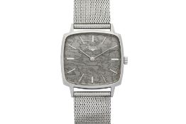 LONGINES — A WOODGRAIN DIAL DRESS WATCH