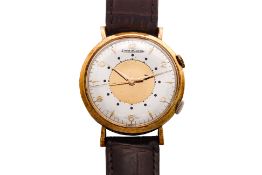 JAEGER-LECOULTRE – A GOLD-PLATED MANUAL-WIND MEMOVOX ALARM WRISTWATCH