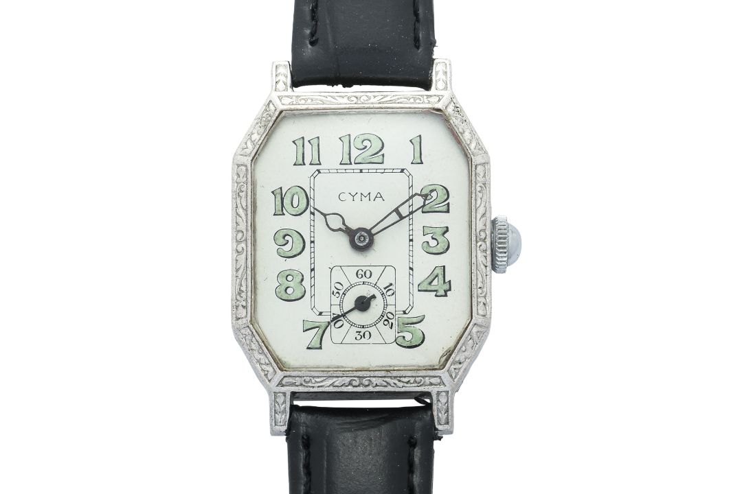 CYMA — AN ART DECO ENGRAVED RECTANGULAR WRISTWATCH - Image 1 of 3