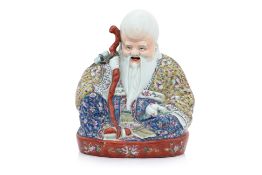 A FAMILLE ROSE PORCELAIN FIGURE OF SHOU LAO