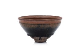 A BROWN-GLAZED STONEWARE BOWL