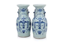 A PAIR OF CELADON GROUND BLUE AND WHITE VASES