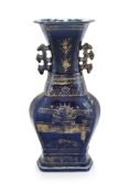 A GILT-DECORATED POWDER BLUE GROUND VASE