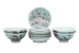 A GROUP OF ENAMELLED CELADON-GROUND PLATES AND BOWLS