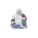 A FAMILLE ROSE PORCELAIN FIGURE OF BUDAI