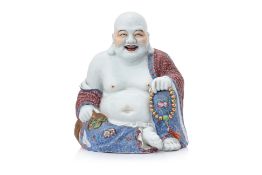 A FAMILLE ROSE PORCELAIN FIGURE OF BUDAI