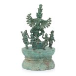 A CAMBODIAN BRONZE FIGURE OF HEVAJRA ON CIRCULAR STAND
