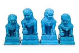 TWO PAIRS OF TURQUOISE GLAZED PORCELAIN FOO LIONS