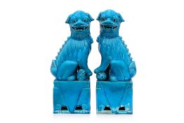 A PAIR OF TURQUOISE-GLAZED FOO LIONS