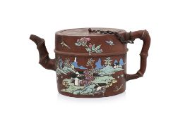 AN ENAMELLED YIXING ZISHA POTTERY TEAPOT