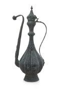 A LARGE SILVER PLATED AND ENGRAVED TURKISH EWER