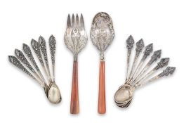 TWO SETS OF SOUTH EAST ASIAN SILVER TEASPOONS AND A PAIR OF SERVERS