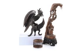 TWO CARVED HARDWOOD FIGURES OF BIRDS AND A SMALL CAGE