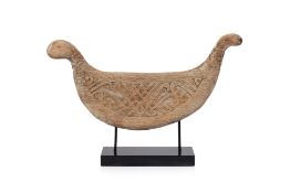 A SOUTH EAST ASIAN CARVED TEAK BOAT FORM PANEL